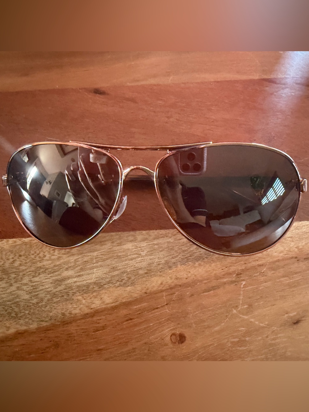 Oakley Pink Metal Frame Sunglasses with Brown Lenses